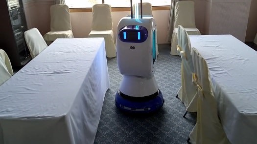 左：紫外線を照射しながら席の間を走行する除菌ロボット
