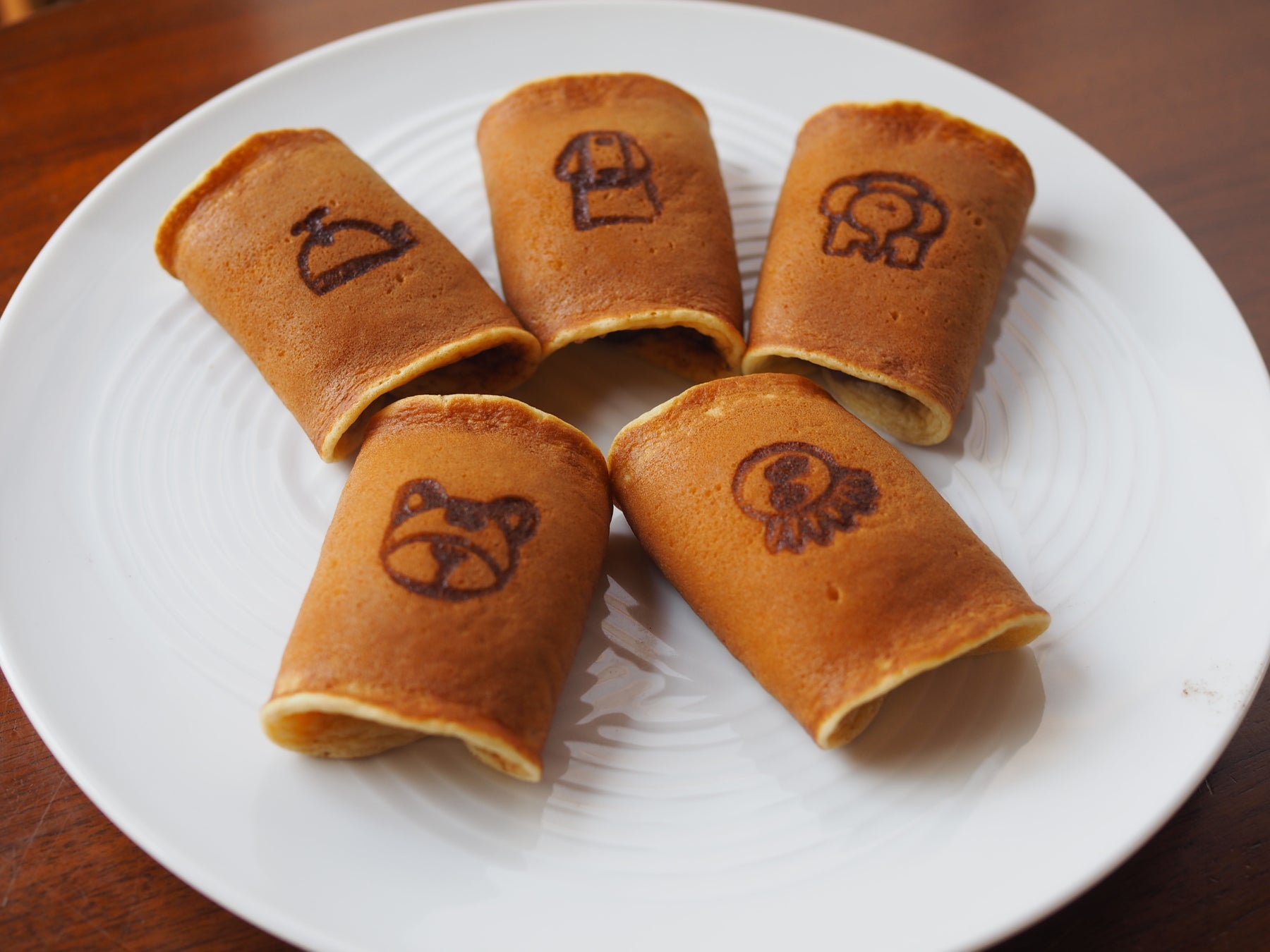 和菓子に“想い”を刻む——老舗和菓子店「お亀堂」が企業・学校向けオリジナル焼印入り「あん巻き」本格展開