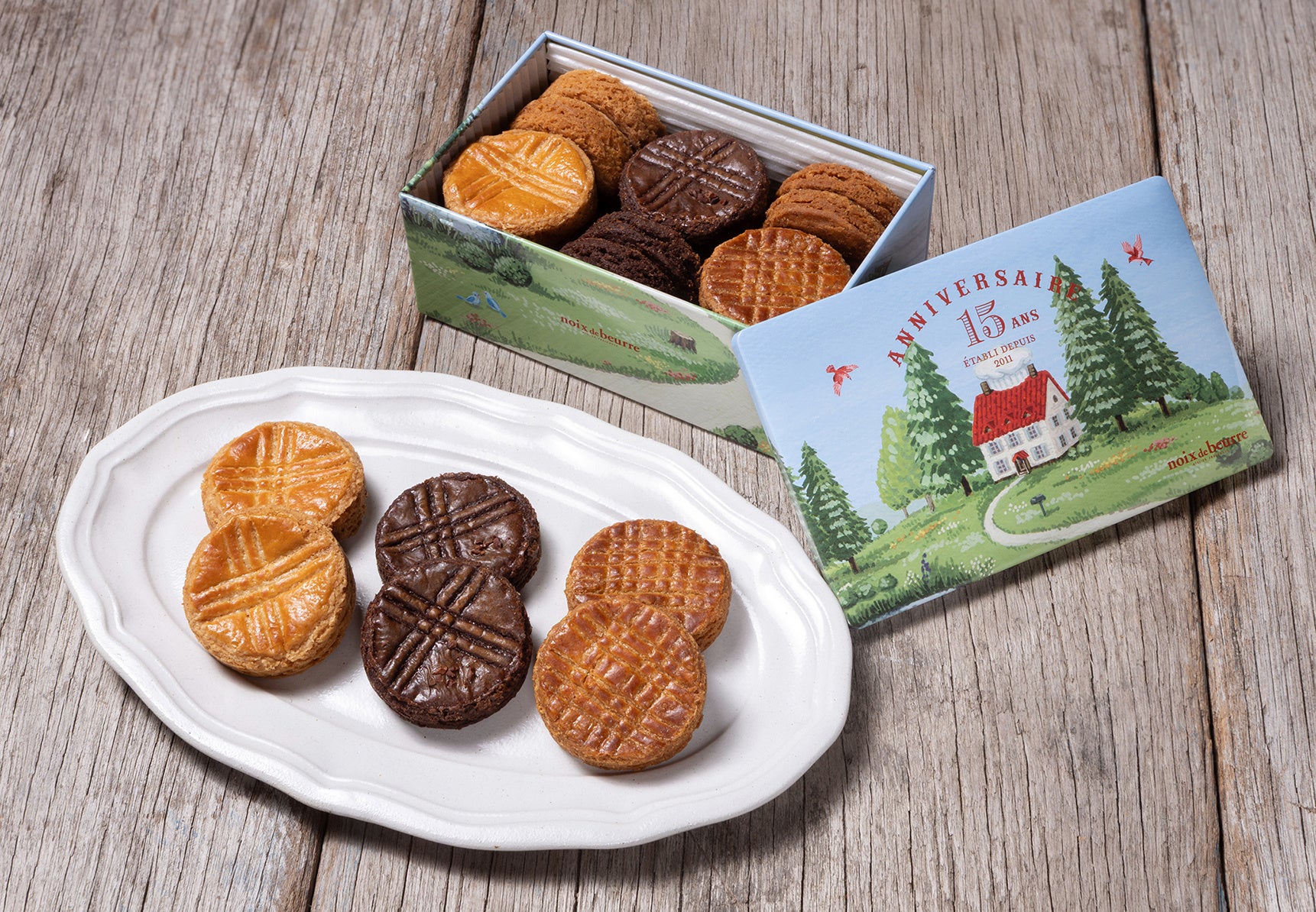 焼きたてフィナンシェが代表商品の〈ノワ・ドゥ・ブール〉は15周年アニバーサリー企画「サブレ・アソルティ(アニヴェルセル)S缶」を3月30日(月)より販売いたします。