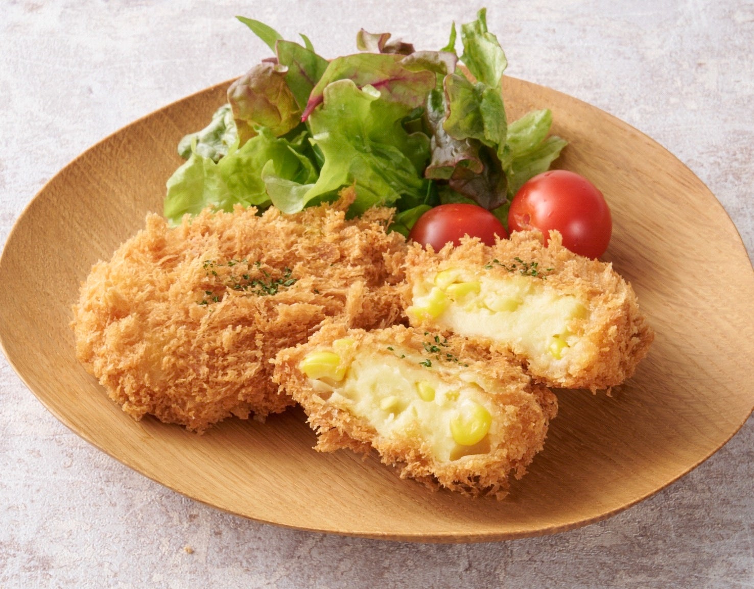 「北海道産コーンクリームコロッケ」を5/6(水)より期間限定で発売　～プチっと弾ける粒感とコーンの甘みを楽しめる～